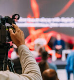 Television cameras at an IT Seminar
