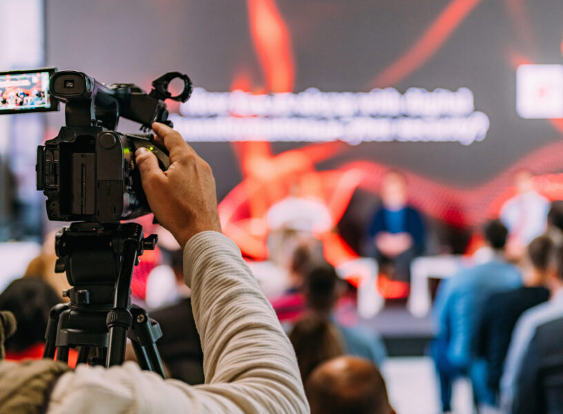 Television cameras at an IT Seminar